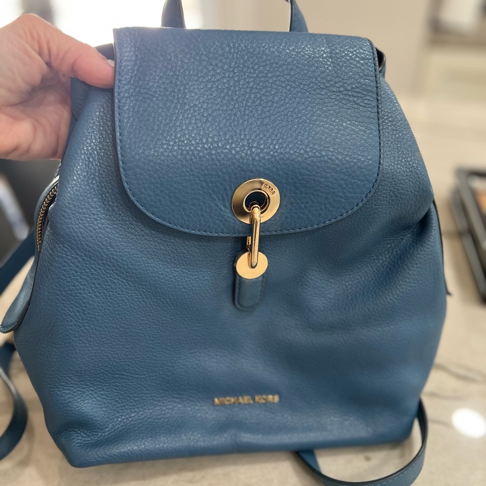 Michael Kors (authentic) medium leather backpack. Blue like new condition
